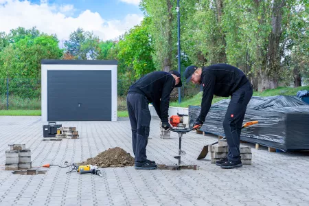 Carport Fundamente erstellen mit einem Erdbohrgerät