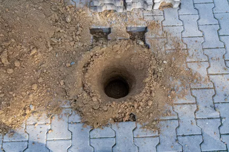 Carport Fundamente erstellen mit einem Erdbohrgerät