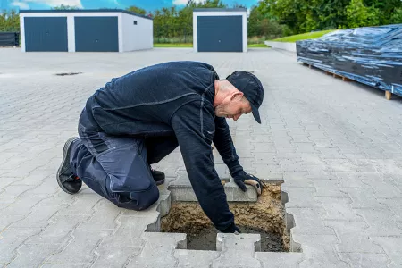 Carport Fundamente erstellen mit einem Minibagger und Erdbohrer